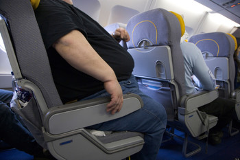 Пассажир подал в суд на British Airways из-за места рядом с полным соседом Пассажир подал в суд на British Airways из-за места рядом с полным соседом